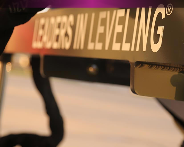 Close-up of leveling equipment with Leaders in Leveling text.